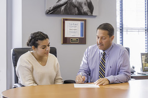 Attorney Robert S. Stephen Talking with a Client